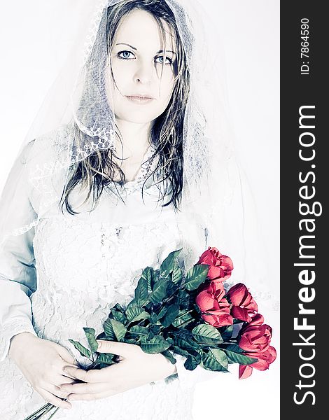 Depressed bride with roses on her wedding day. Depressed bride with roses on her wedding day