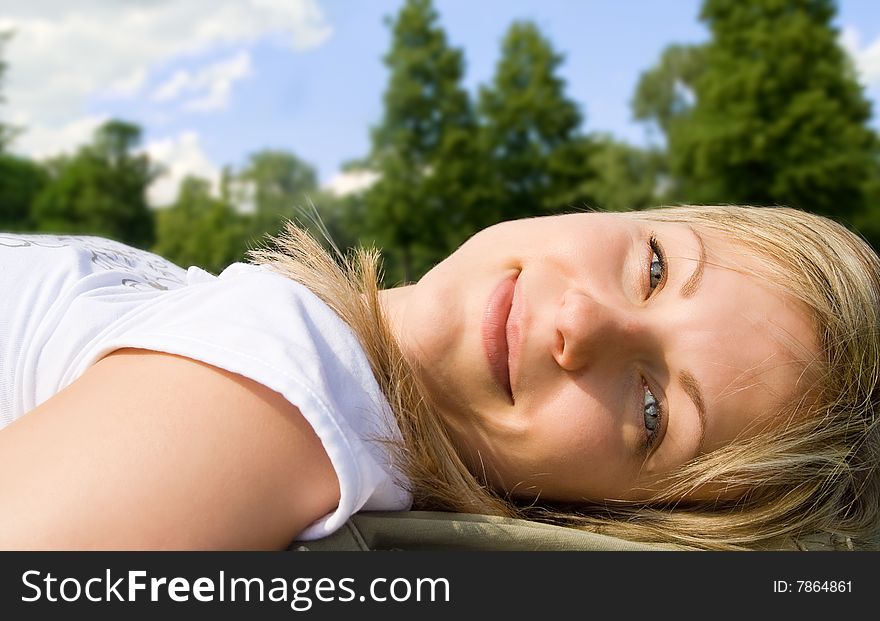 Carefree blonde in the grass