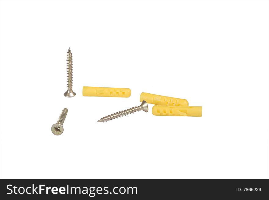 Three screws and three plugs isolated over white background. Three screws and three plugs isolated over white background.