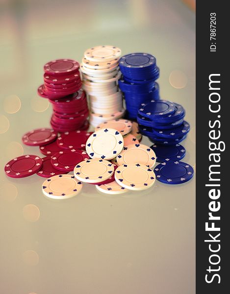 Red, white and blue poker chips for big money win. Red, white and blue poker chips for big money win.