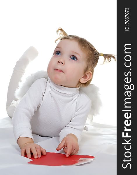 Stock photo: an image of a little cupid with wings and paper heart