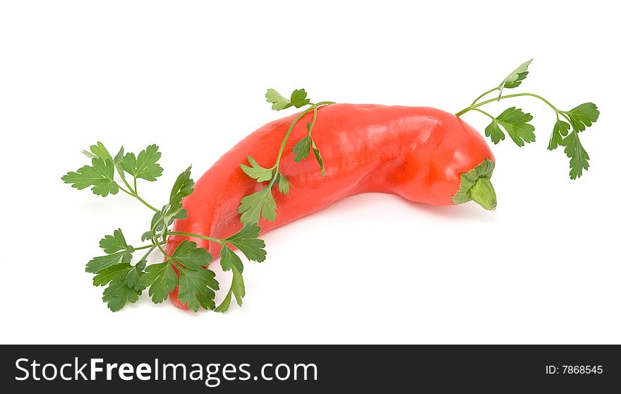 Hot pepper and parsley isolated on white background