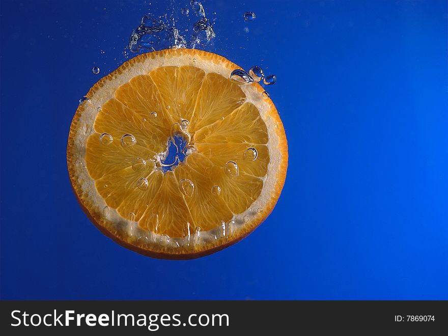 Orange slice in water