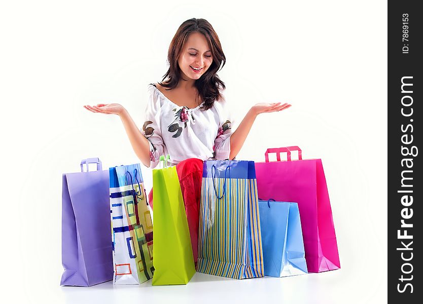 Shopping girl whit diverse bags,isolated on white background. Shopping girl whit diverse bags,isolated on white background