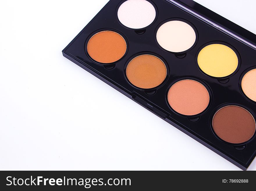 Makeup and Cosmetics. Makeup Palette and tools on a white background