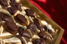 Chocolates Box On Red Satin Royalty Free Stock Photography Chocolates Box On Red Satin Royalty Free Stock Photography