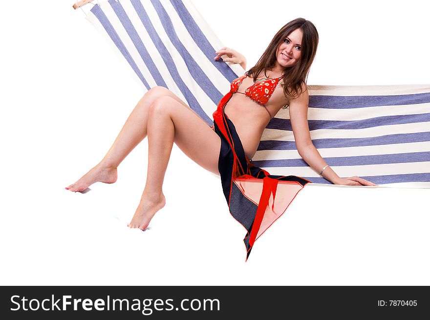 Sexy girl wearing red bikini relax on hammock
