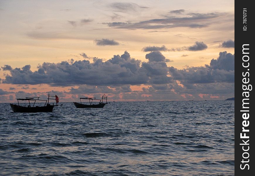 Two boats at a sunset in Vietnam