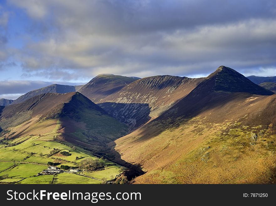 A view of Causey Pike, Sail, and Ard Crags from Cat Bells Ridge showing a deep valley