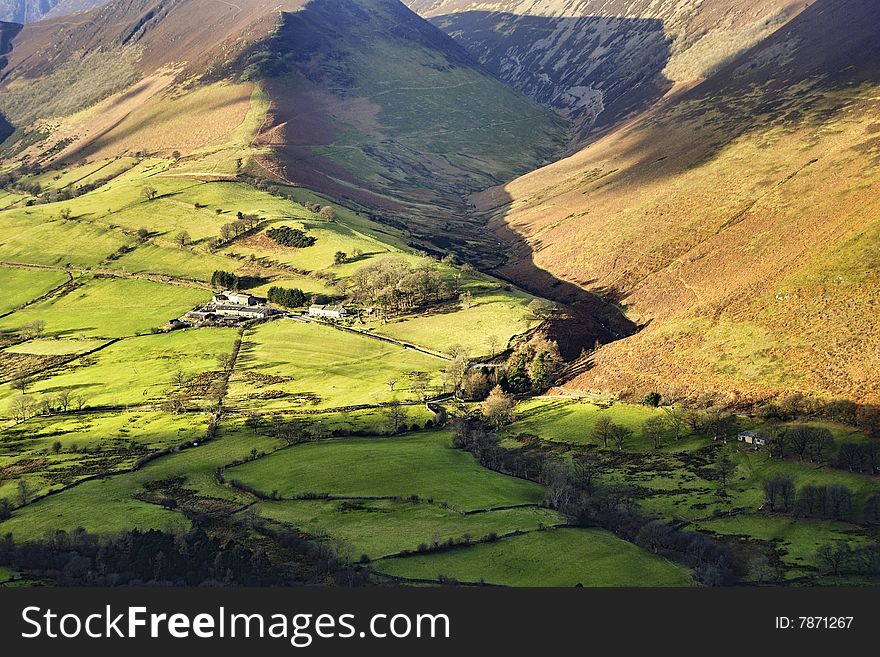 An aerial view of an Isolated farm in the Newlands Valley, Cumbria in the English Lake District