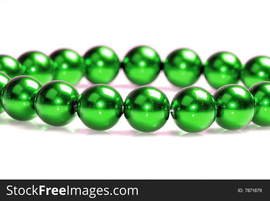 Green pearl set isolated on white background.