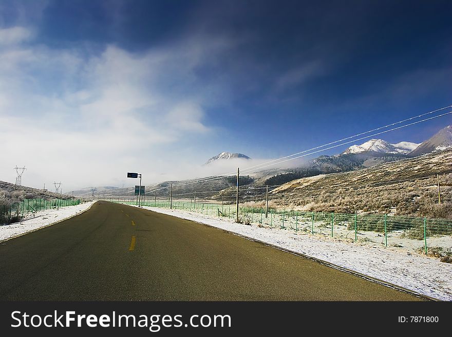 The highway of high mountain imitates a Buddha to lead to heaven. The highway of high mountain imitates a Buddha to lead to heaven