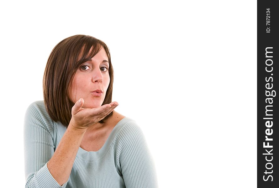 Female blowing a kiss to others