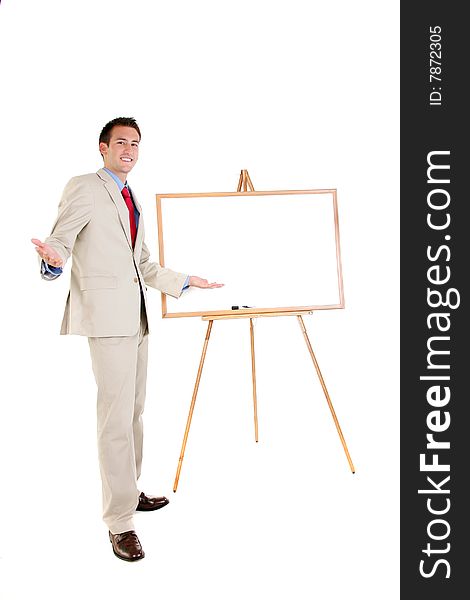 Proud business man showing off his work on a whiteboard