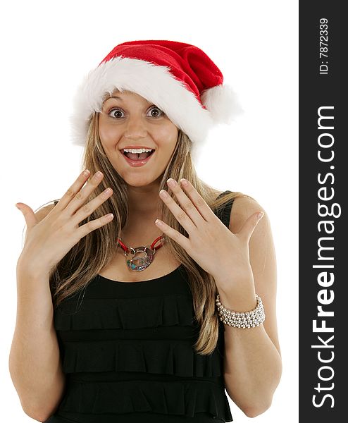 Sexy woman in a santa hat looking surprised. Sexy woman in a santa hat looking surprised