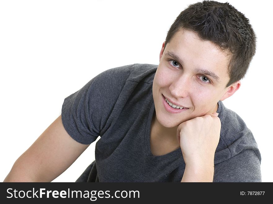 Attractive male model posing and smiling at the camera. Attractive male model posing and smiling at the camera