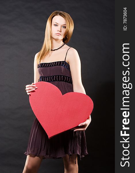 Girl In Dress Holding Red Heart