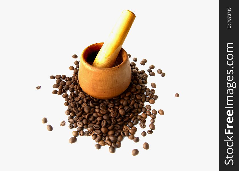 Mortar for crushing coffee with grains of coffee. Mortar for crushing coffee with grains of coffee.