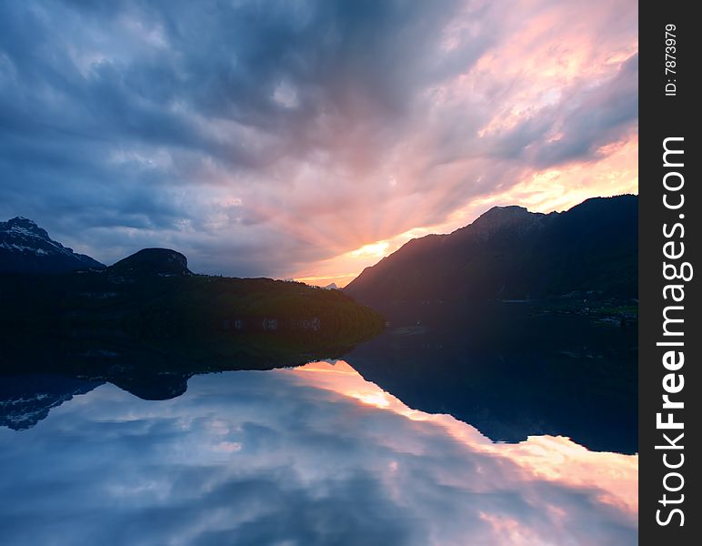 Evening sunset colorful lake and reflection. Evening sunset colorful lake and reflection