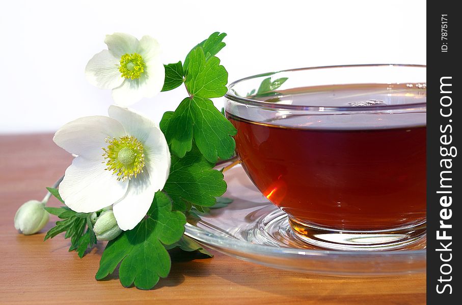 Bouquet of spring flowers and cup of tea. Bouquet of spring flowers and cup of tea