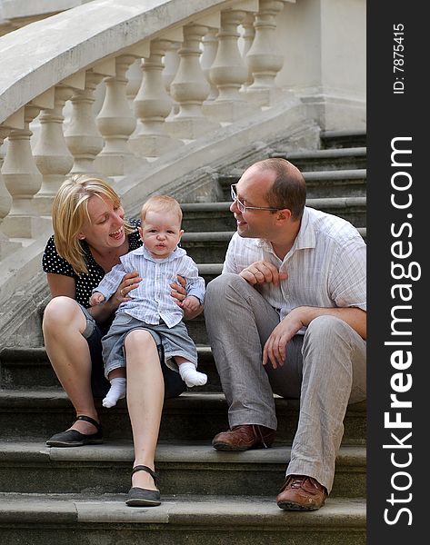 Mother father and child in a park