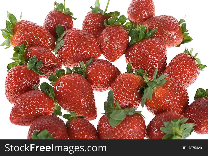 Red strawberry fruits isolated on white background