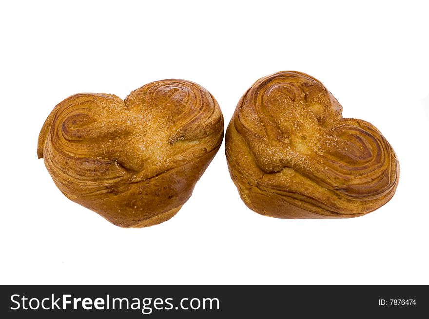 Rich roll in the form of heart on a white background. Rich roll in the form of heart on a white background