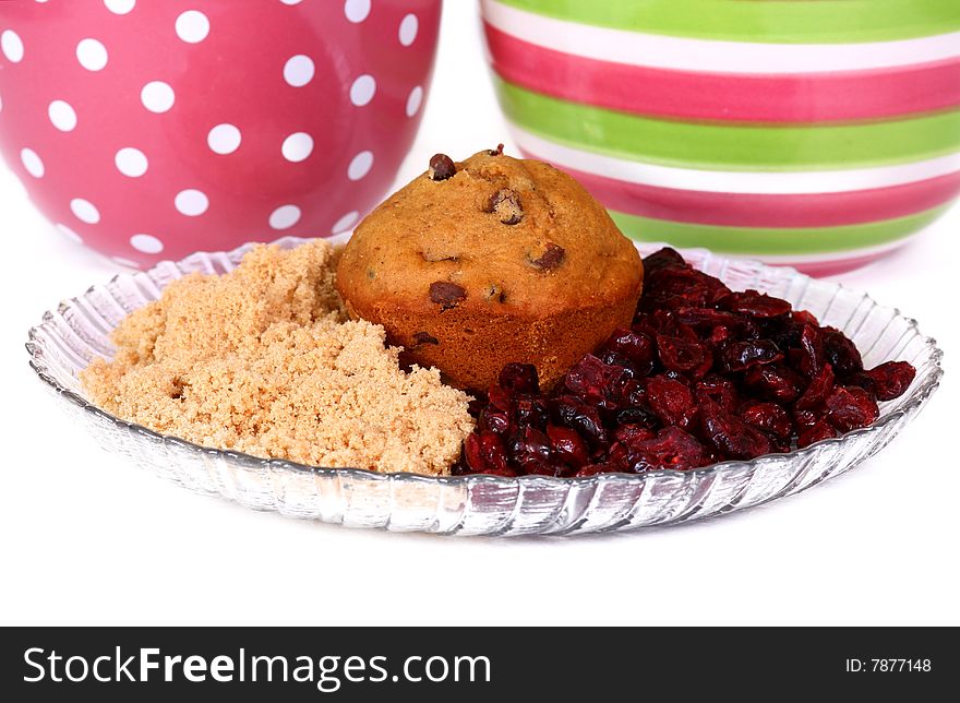 Cranberry chocolate chip muffins with mixing bowls. Cranberry chocolate chip muffins with mixing bowls