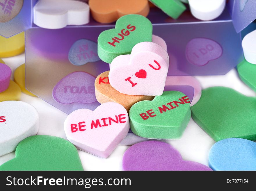 Foam hearts with phrases spilling out of a box. Foam hearts with phrases spilling out of a box