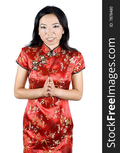 Chinese girl in traditional dress - QiPao, preparing for celebration of Chinese New Year in Shanghai, China. Chinese girl in traditional dress - QiPao, preparing for celebration of Chinese New Year in Shanghai, China.