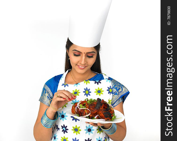 Asian female chef with her roasted chicken