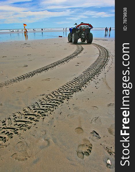 Tyre track on beach created by lifeguard 4WD vehicle. Tyre track on beach created by lifeguard 4WD vehicle