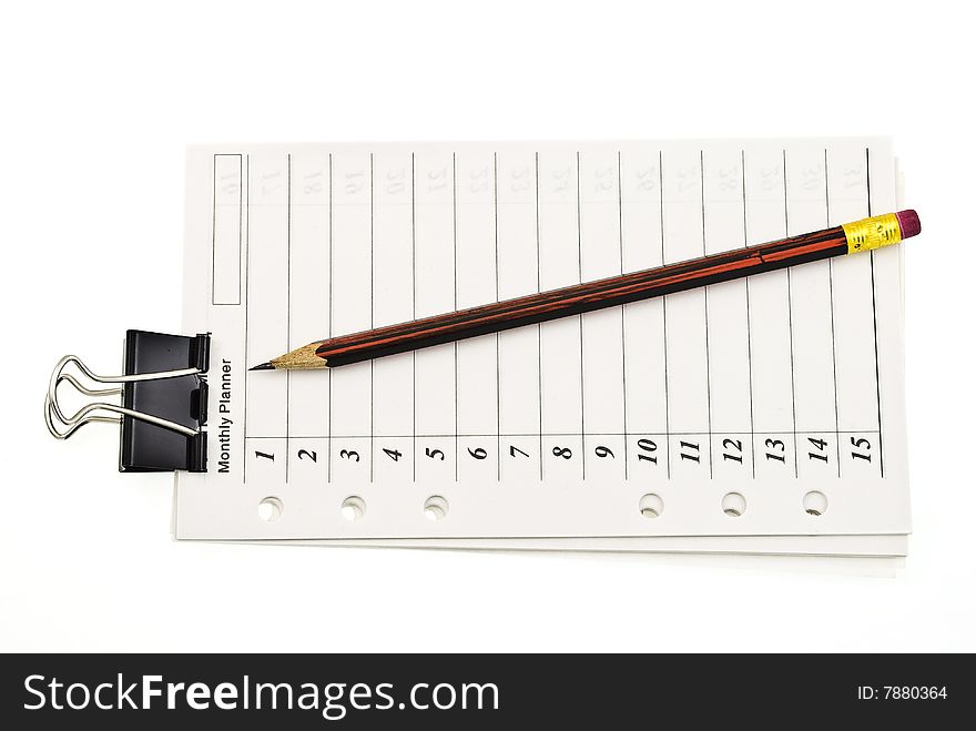 Notepad with pencil on white background