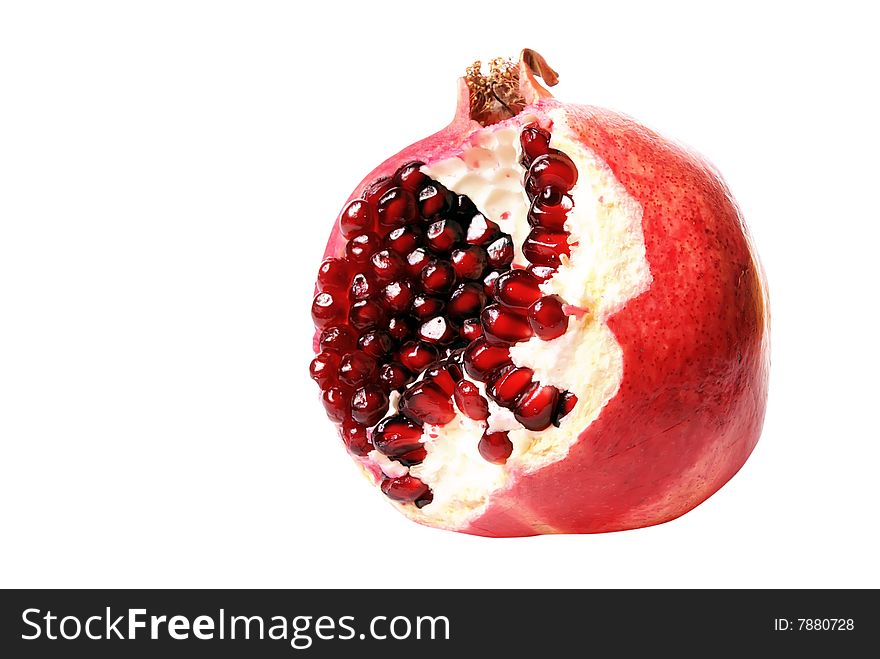 A beautiful picture of ripe pomegranate isolated on a white background