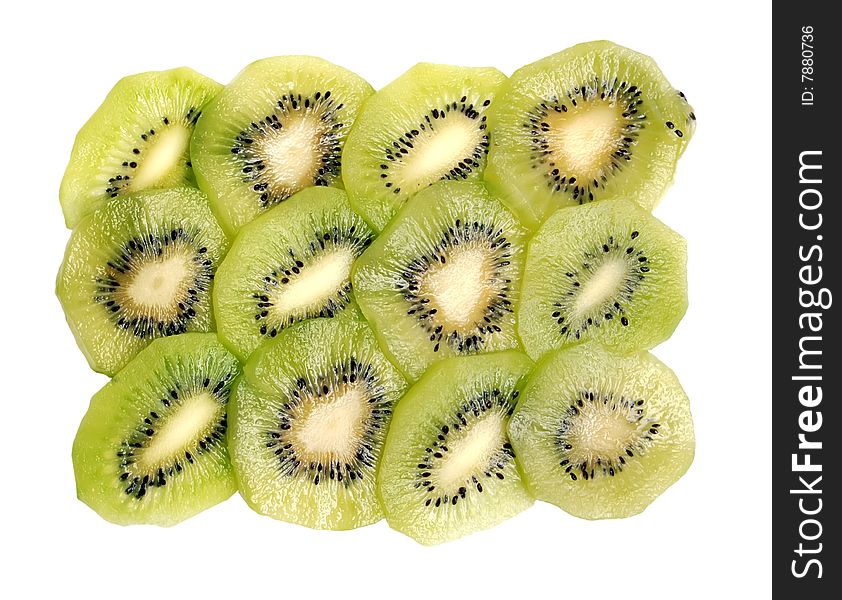 Beautiful green texture consisting of slices of kiwifruit on a white background