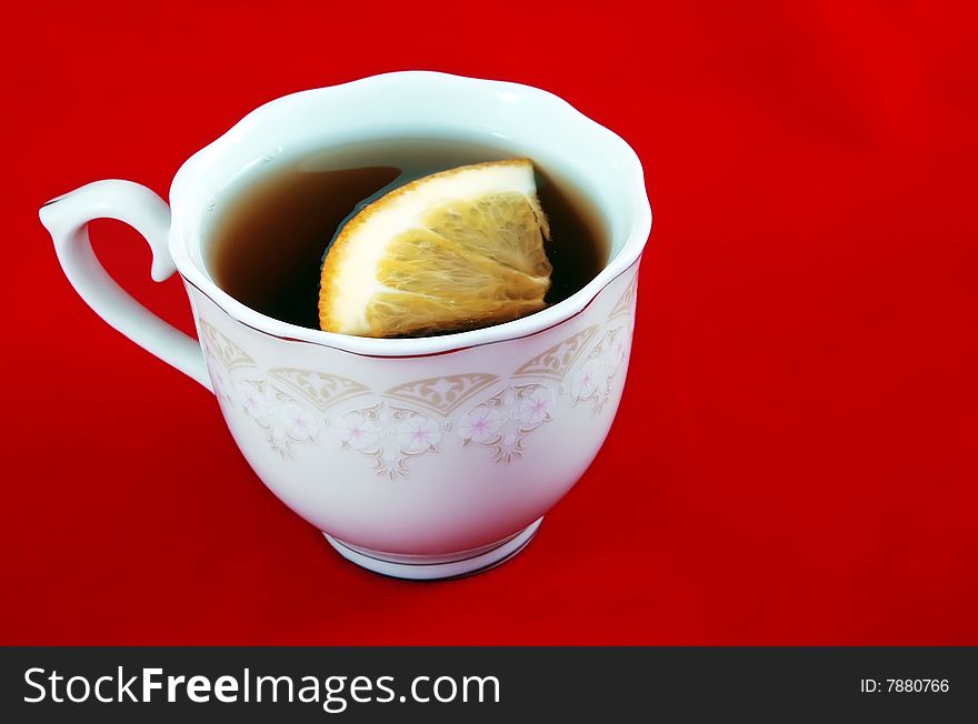 A cup of tea with lemon