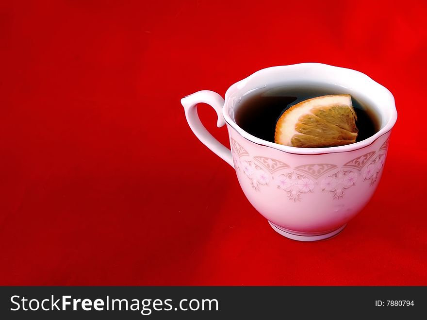 Beautiful still life cup of tea with lemon.