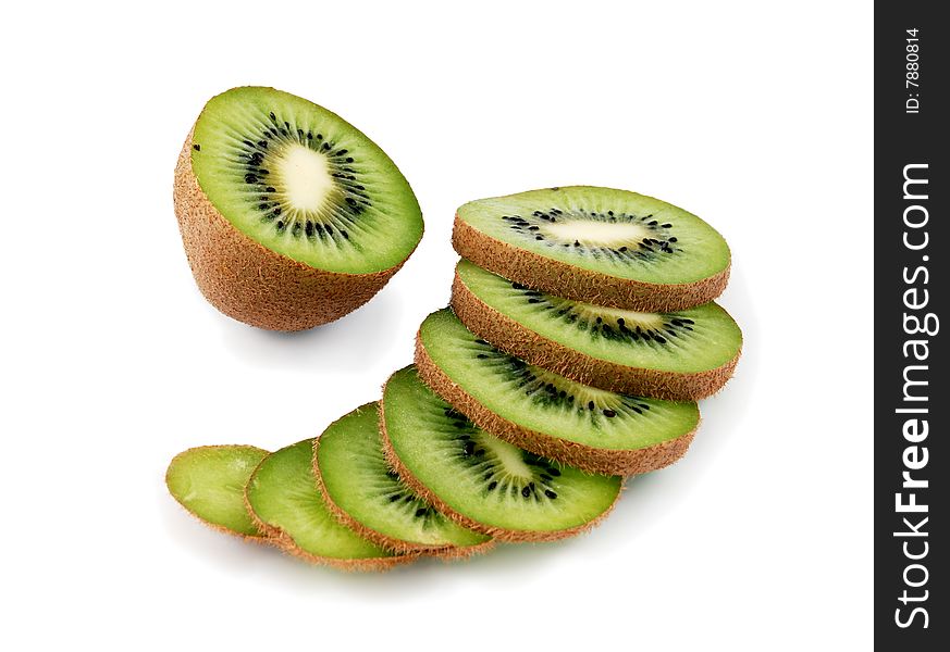 Beautiful green texture consisting of slices of kiwifruit on a white background