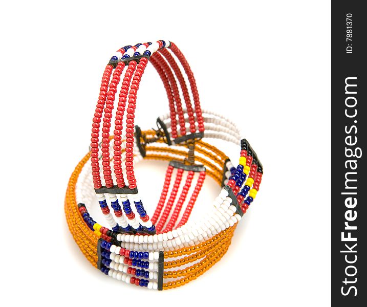 Three african bracelets on white ground