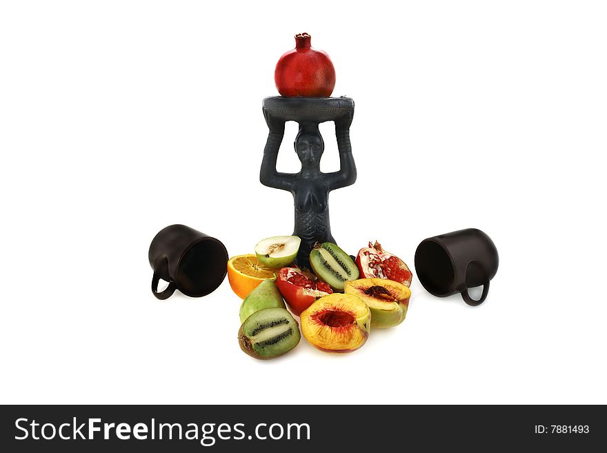 Figurine And Fruit