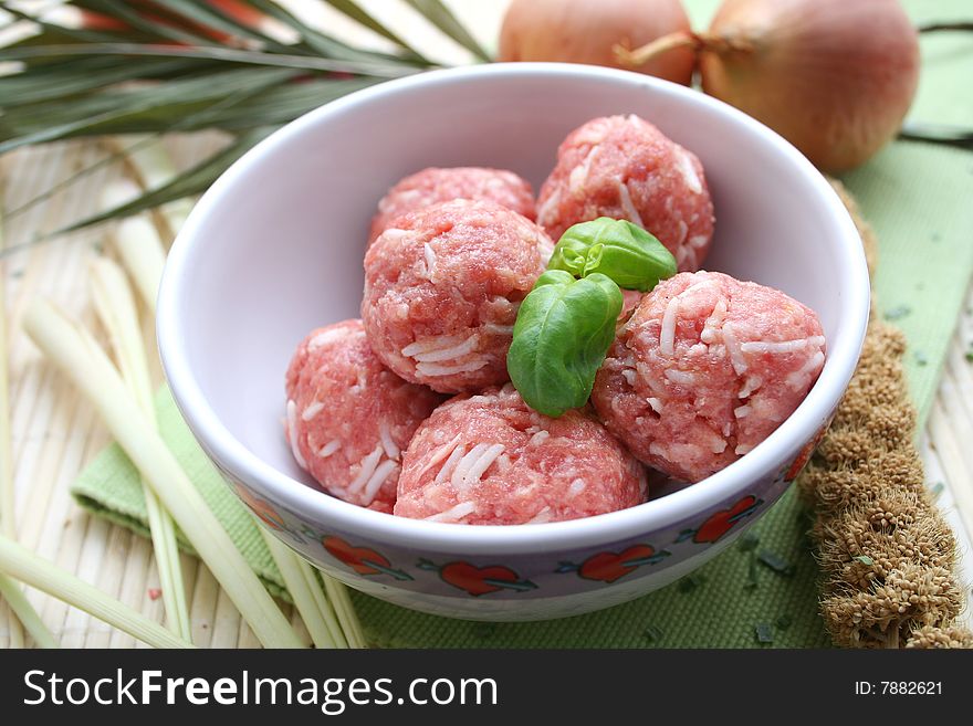 Fresh balls of meat with rice and basil. Fresh balls of meat with rice and basil