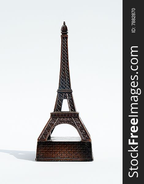 Front of eiffel tower with shadow on white background