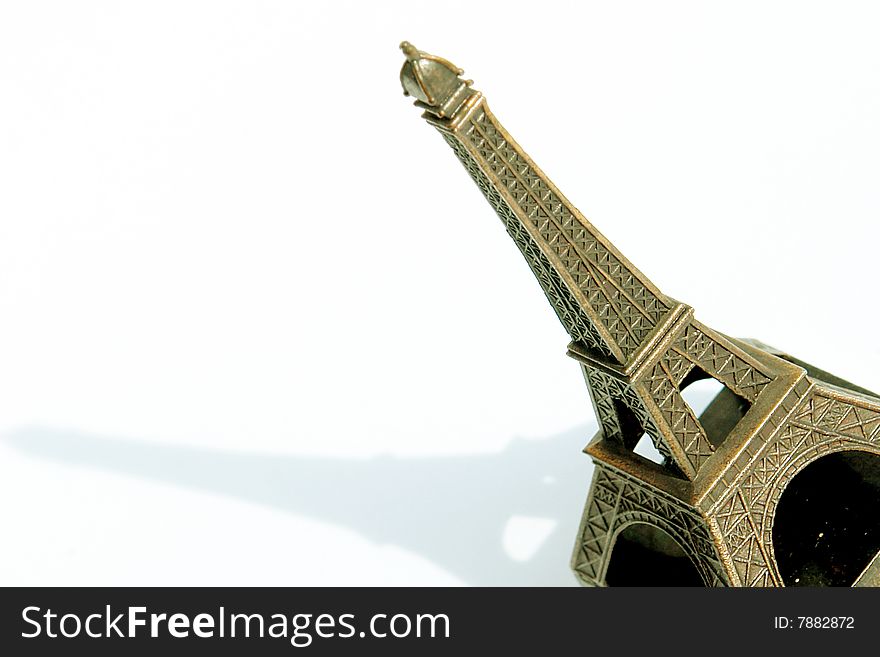 Eiffel tower with shadow on white background