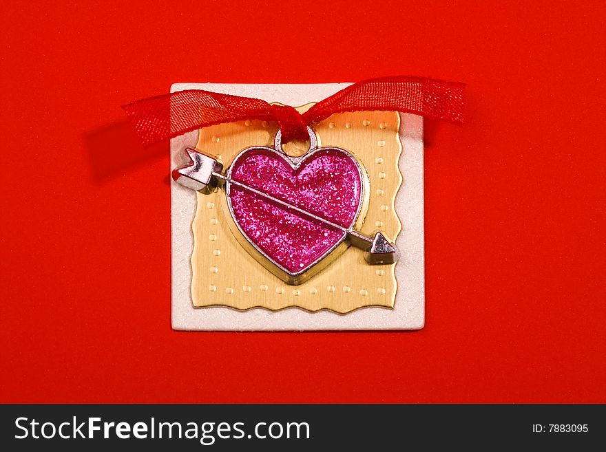 Decoration in heart form with ribbon