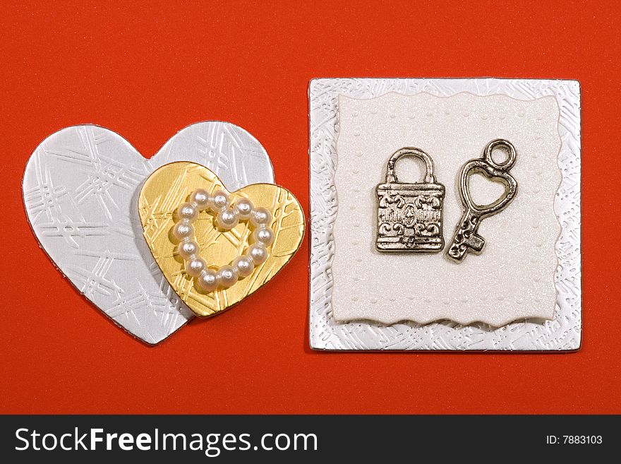 Accessories for congratulation card are lock, key, hearts