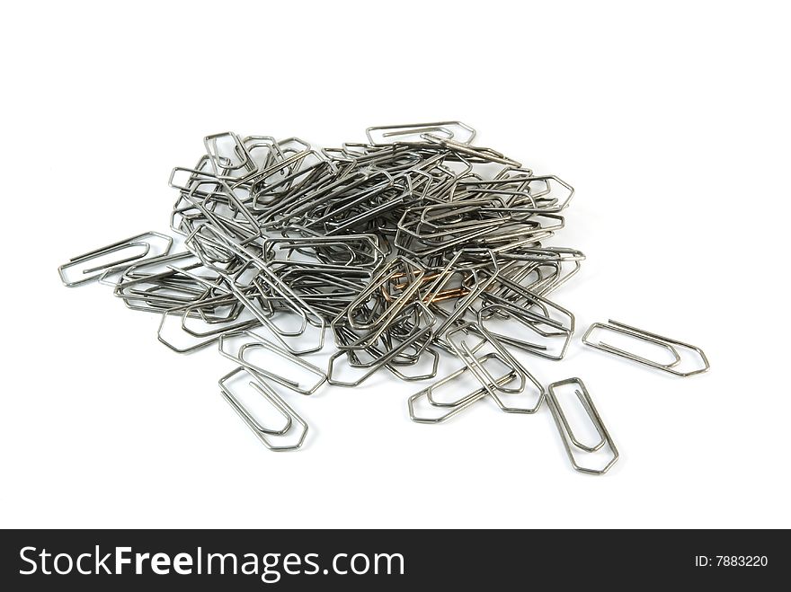 A stack of safety pins isolated on white background