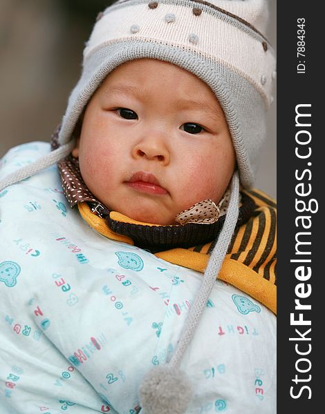 Chinese baby look at camera