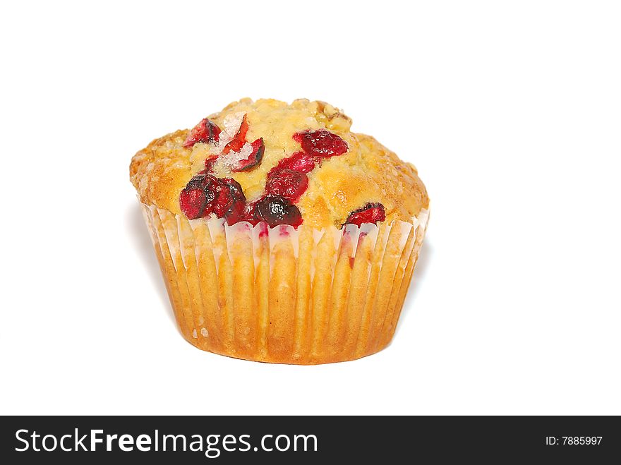 Fresh cranberry muffin isolated on the white. Fresh cranberry muffin isolated on the white.