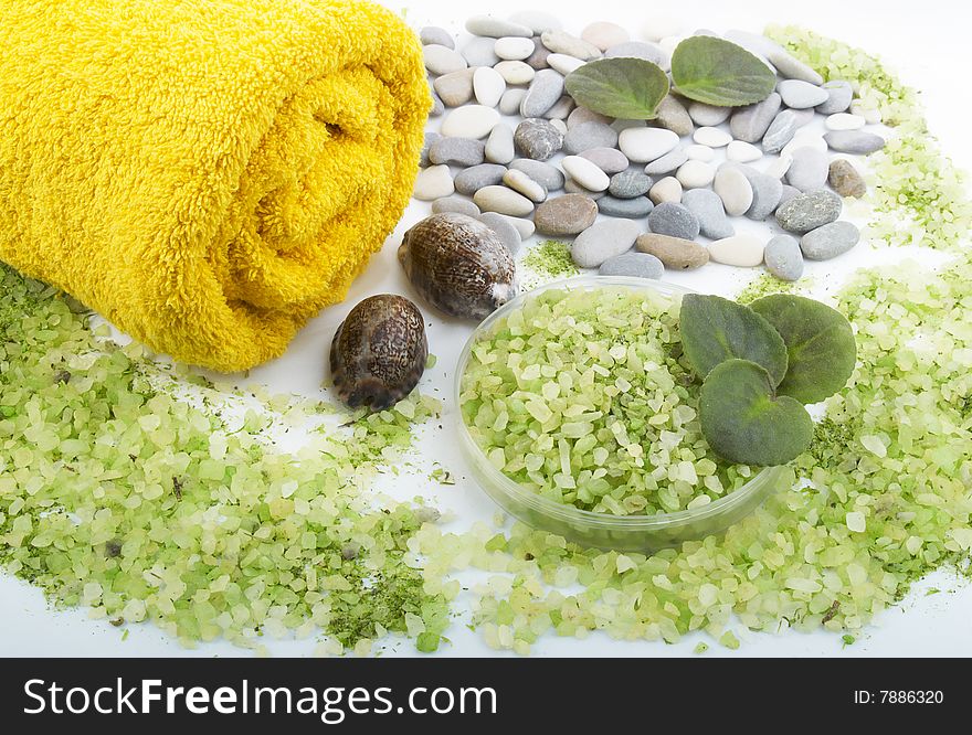Herbal salt and towel. spa and body care background. Herbal salt and towel. spa and body care background