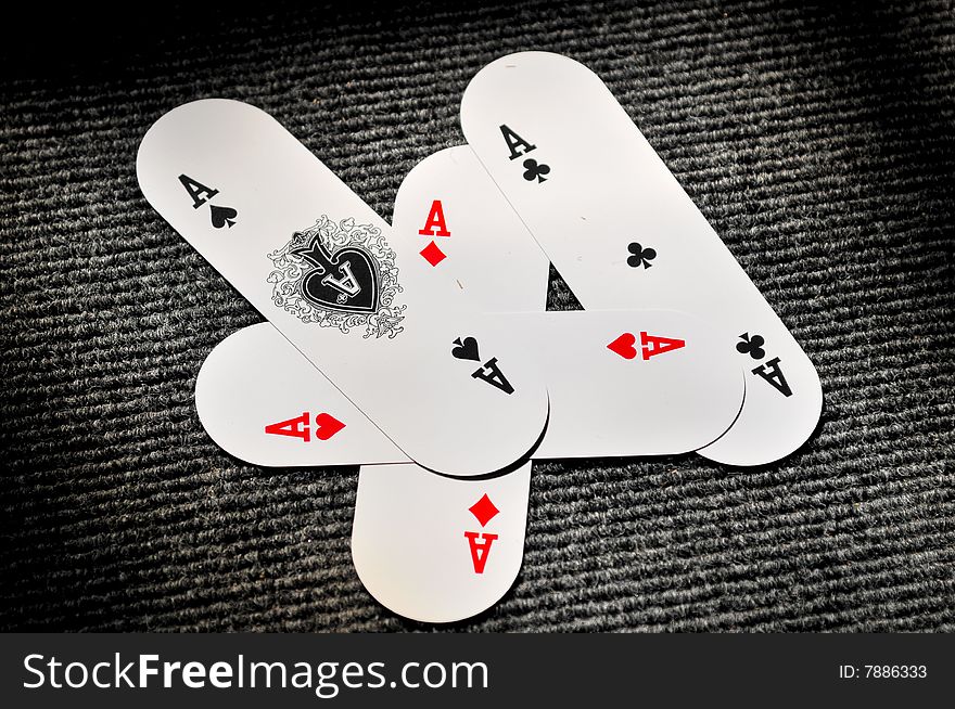 Aces cards isolated on black.